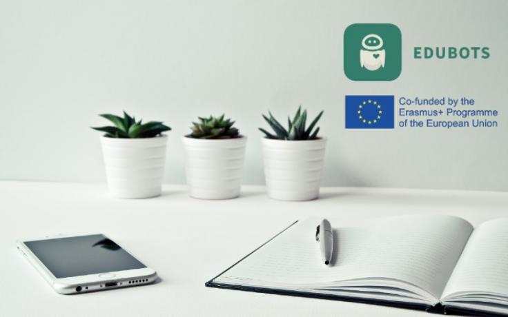 mobile phone and notebook on a table