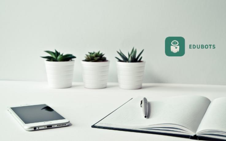 mobile phone and notebook on a table
